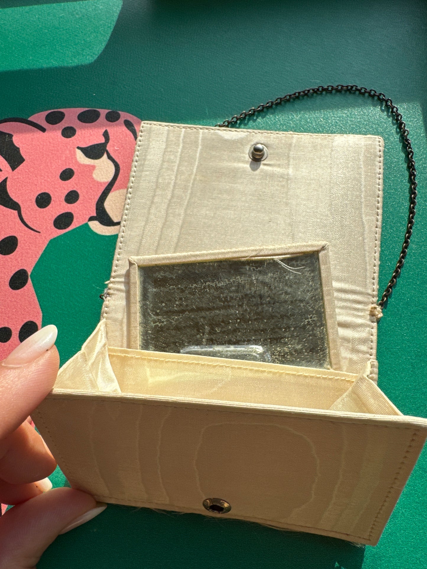 Beautiful rhinestone and enamel art deco 1920s modernist mini minaudiere with chain. Celluloid with geometric in layers, give it the jazz age glamour. Over 100 years old!