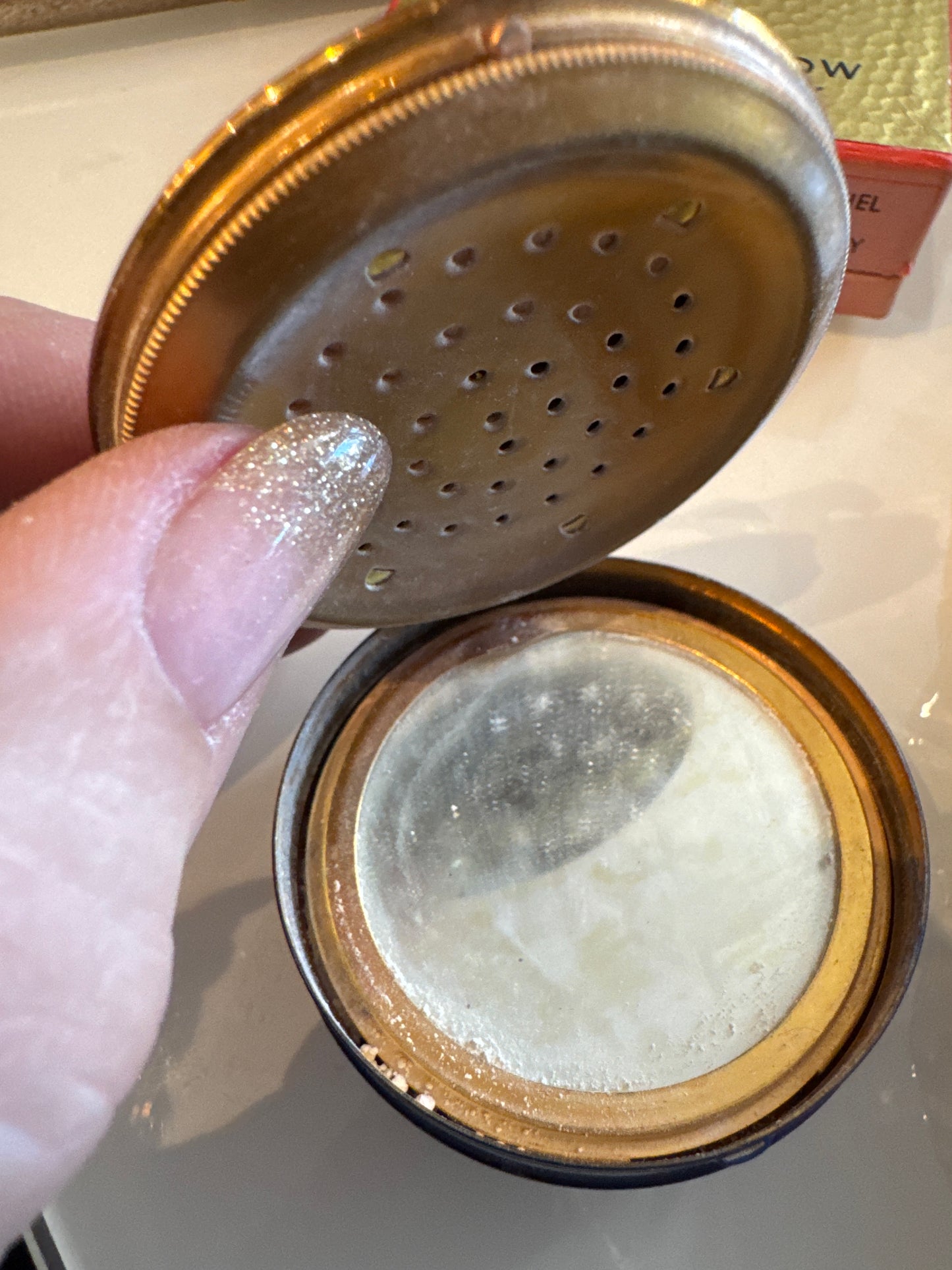 vintage refillable lipstick holder with mirror. Folds up.