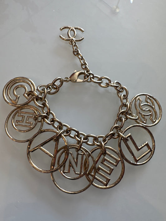 Beautiful light gold, Chanel charm bracelet with jumbo charms