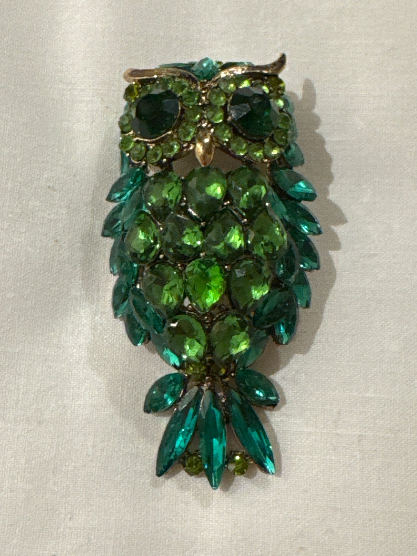 vintage 1980s rhinestone green owl brooch. Sourced in Paris.