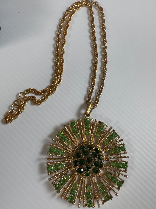 vintage 1960 gold tone, jumbo pendant necklace with green sunburst rhinestones