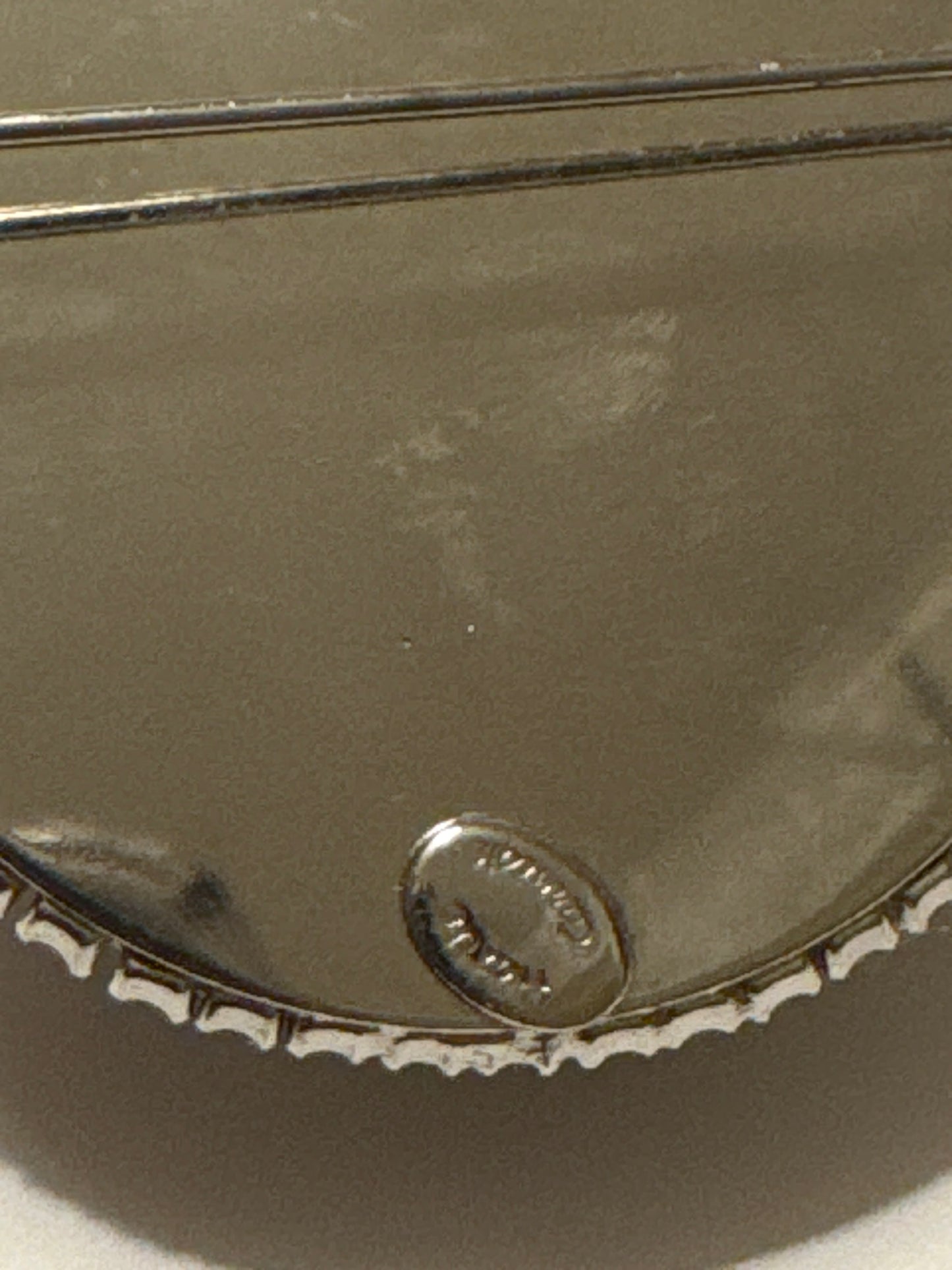 mid 1950s signed Hattie Carnegie pave dome brooch with Ruby red glass center, stone and hundreds of individually set pronged rhinestones