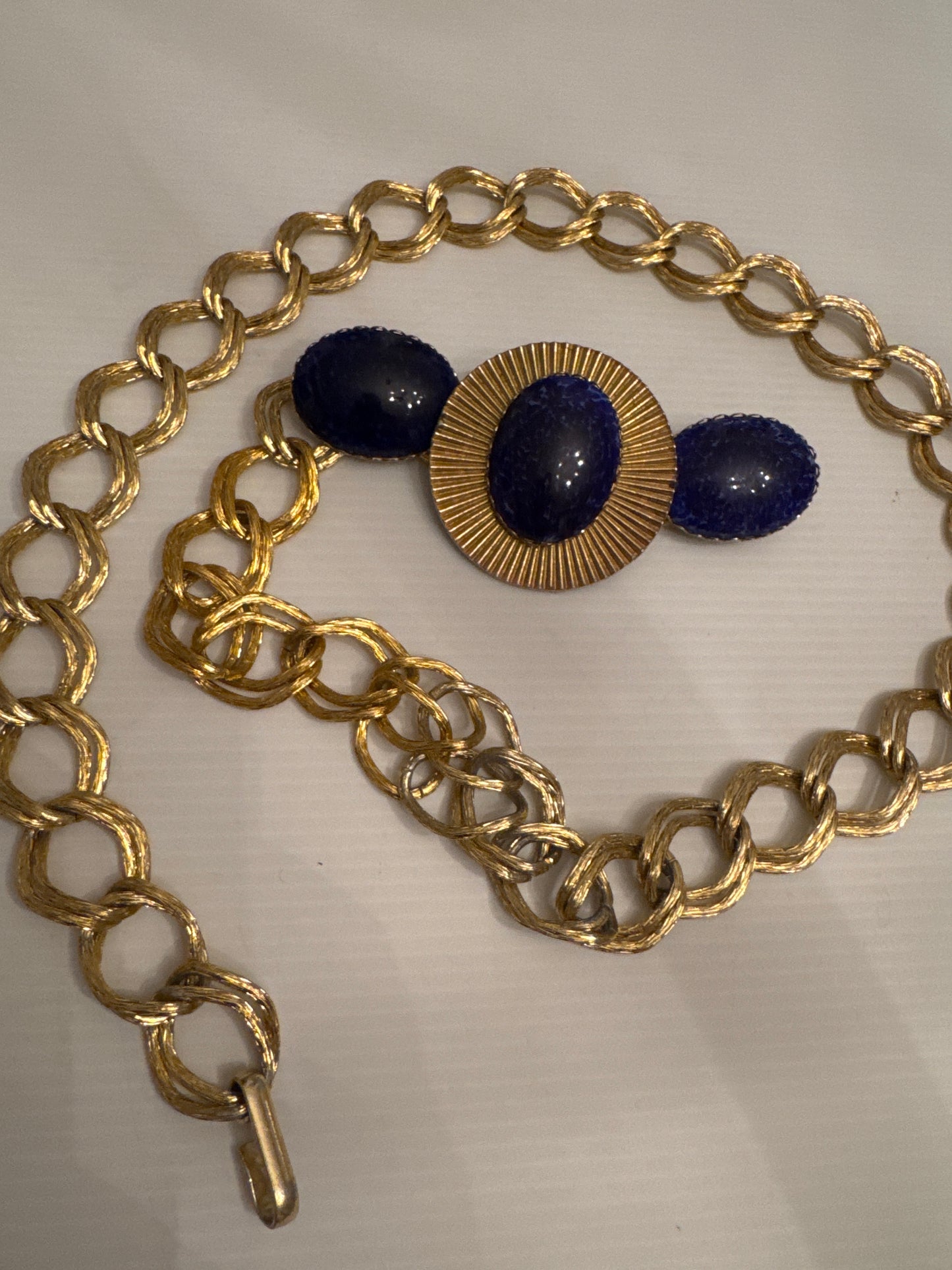 Beautiful 1970s vintage gold tone belt with blue cabachon stones
