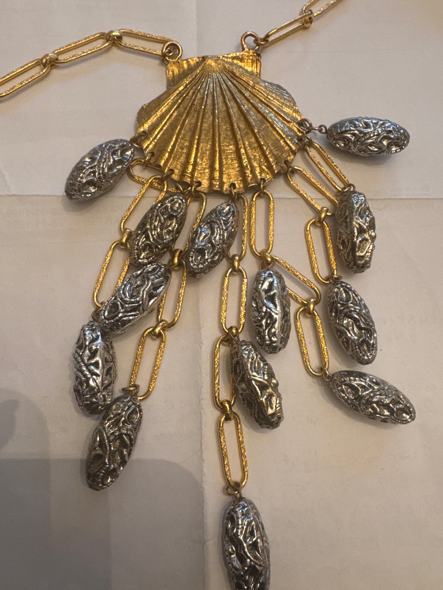 stunning vintage 1960s dangle scallop shell pendant necklace. Both gold and silver tone. Sourced in Paris. PARIS LIVE