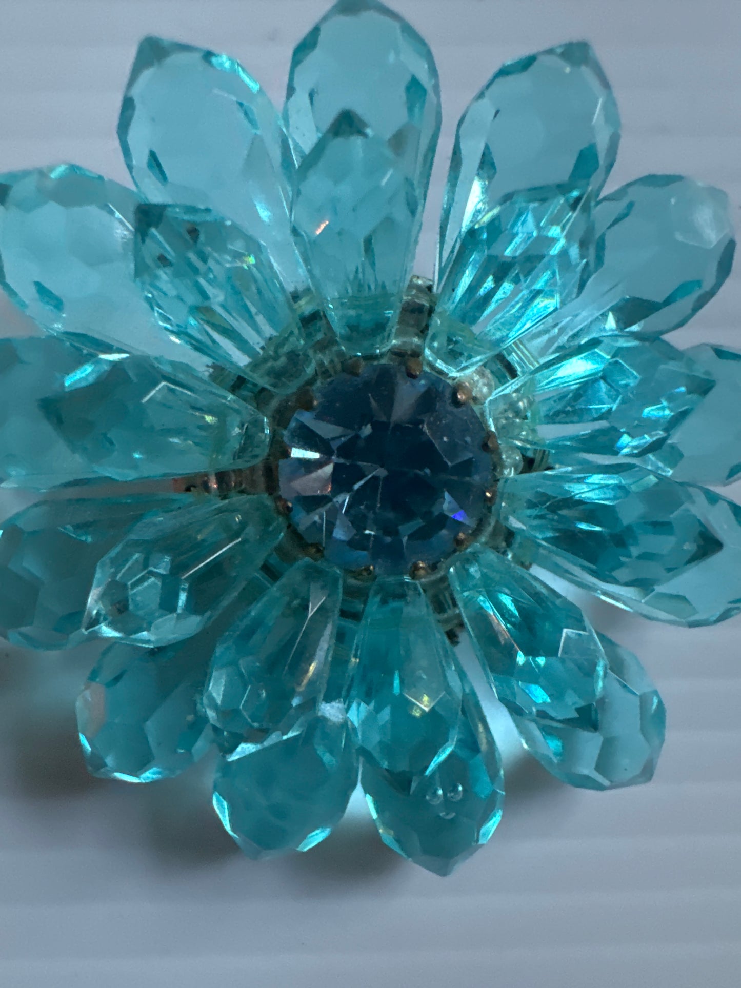 Light blue mid-century signed, made in western Germany flower brooch with rhinestone center