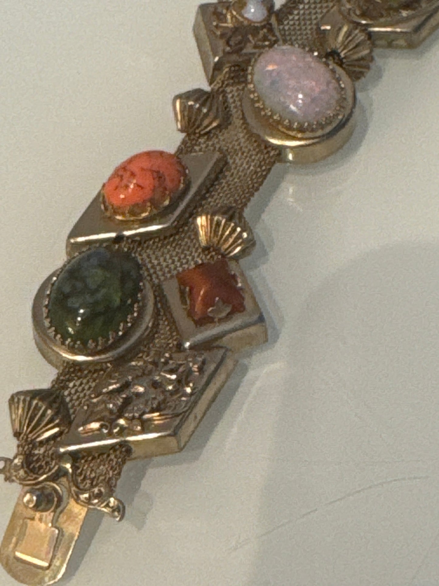 Stunning wire gold tone slider bracelet with over 10 charms. Sourced in Paris.