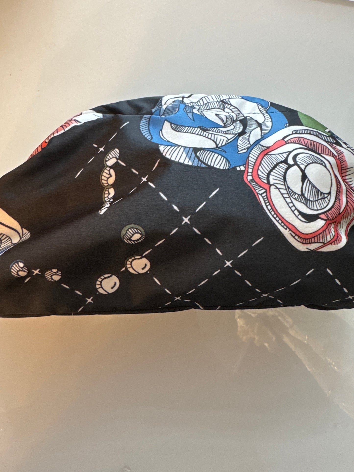 Vintage medium silk scarf reimagined as a clutch bag. Comes with optional crossbody chain. Each bag is made by hand so pattern may change slightly.