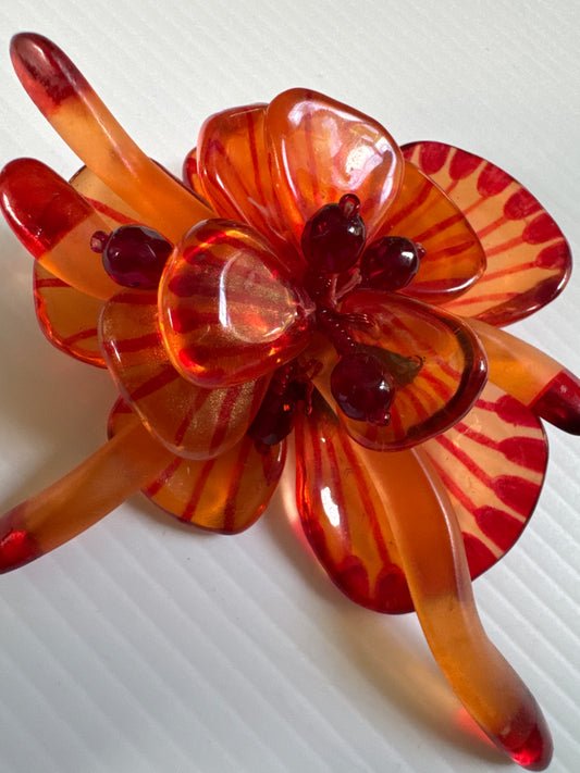 1960s orange, movable lucite flower brooch