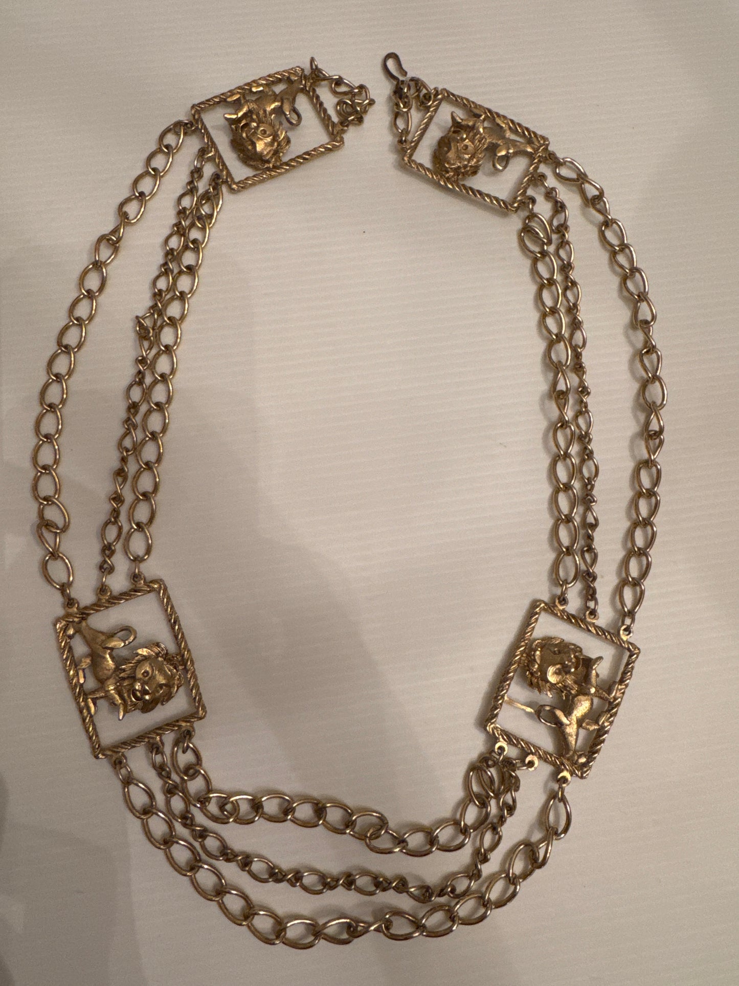 Vintage 1970s gold tone, lion embellished belt