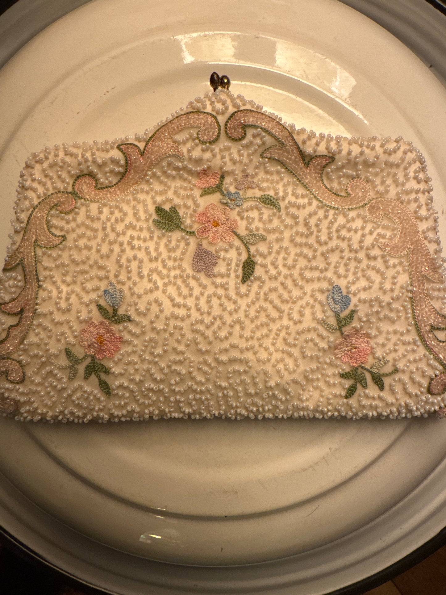 stunning vintage white beaded clutch bag with kiss lock, petite pointe flowers. Sourced in Paris.