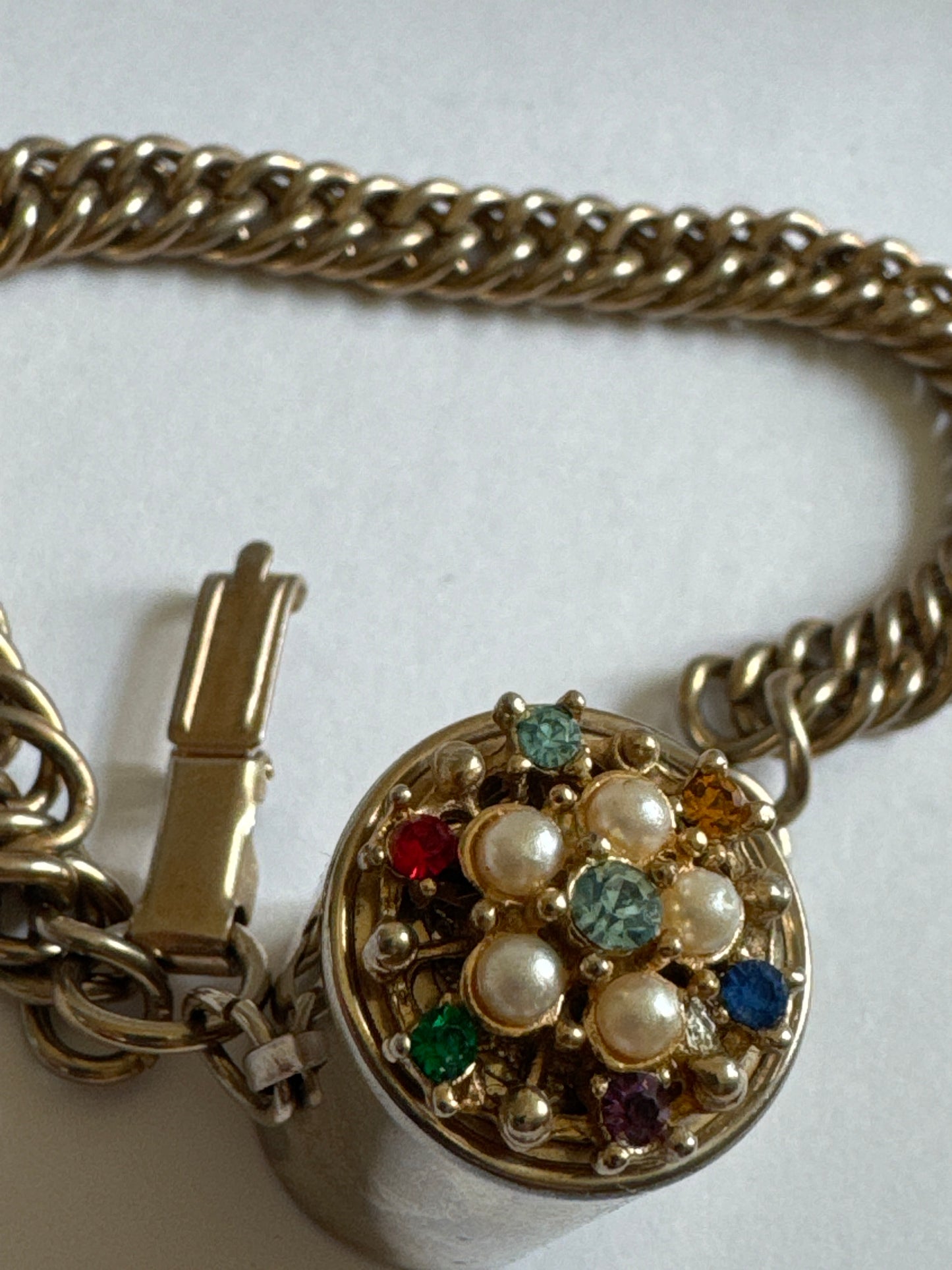 1960s rhinestone dime bank charm bracelet