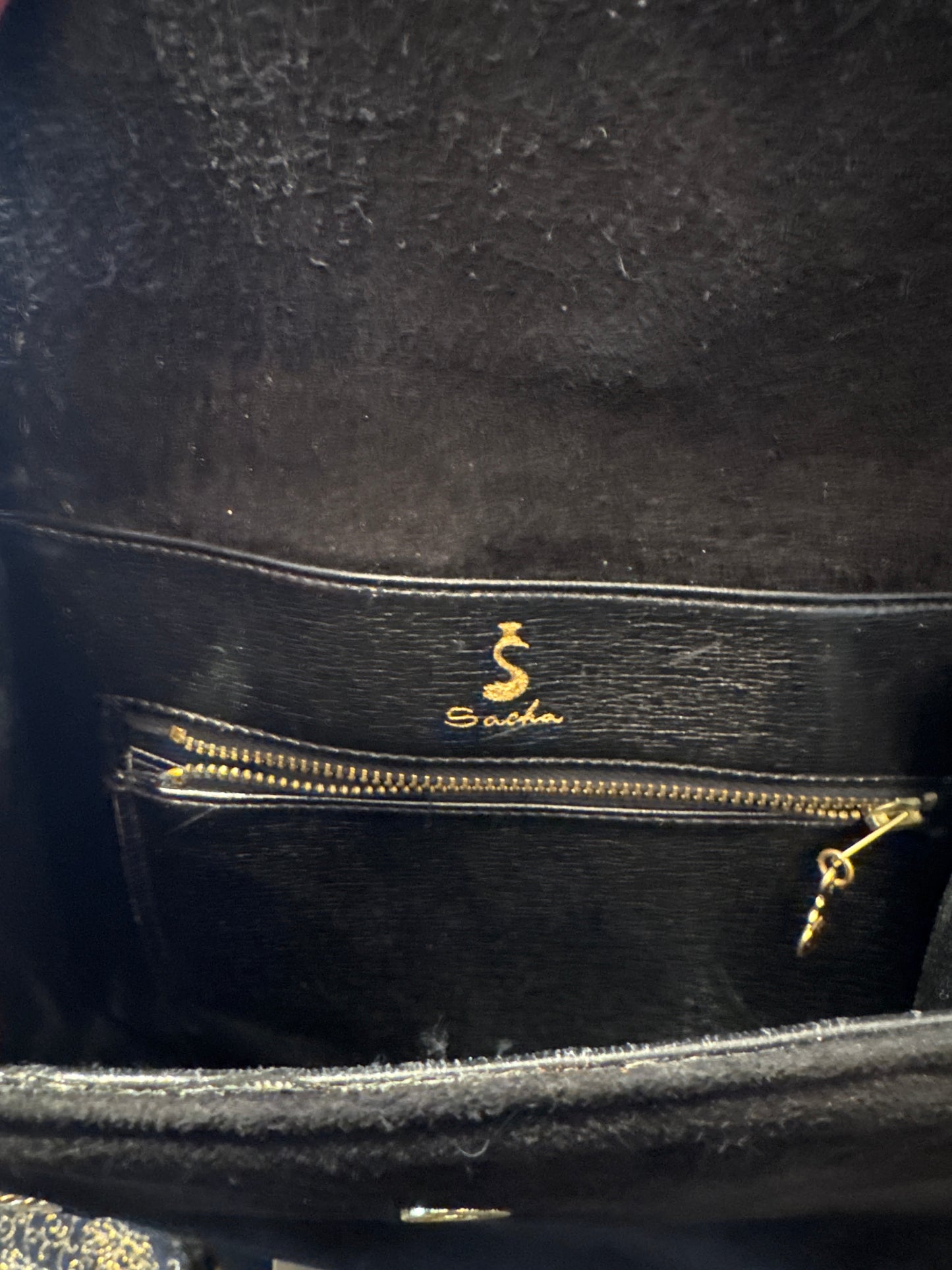 Stunning 1970s black suede with gold hardware shoulder bag. RARE and unique.
