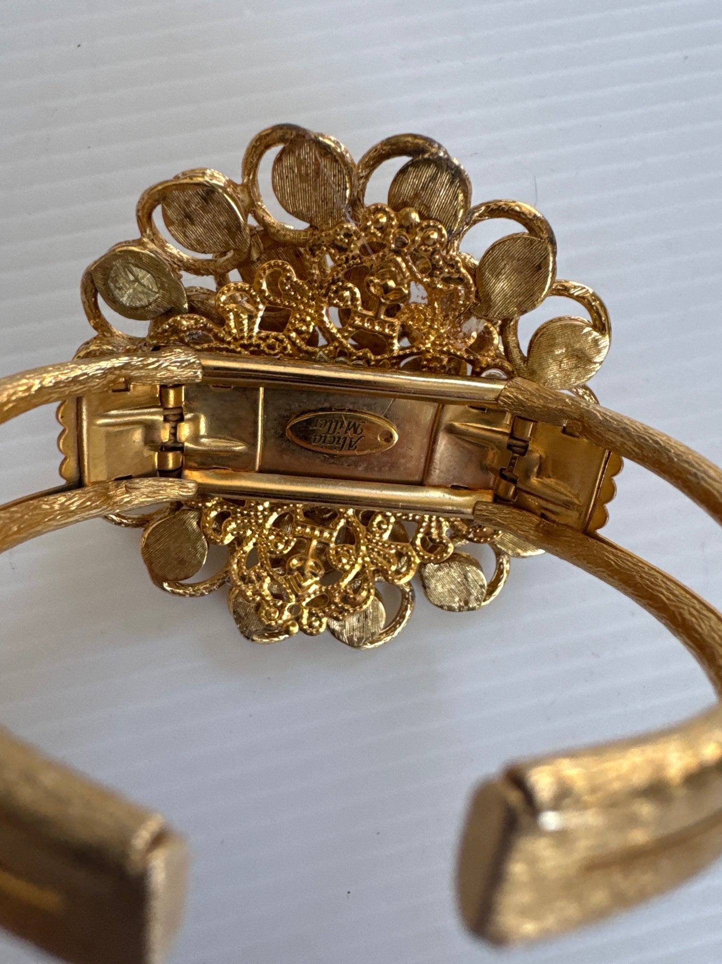 1960s brooch repurposed on a vintage cuff bracelet