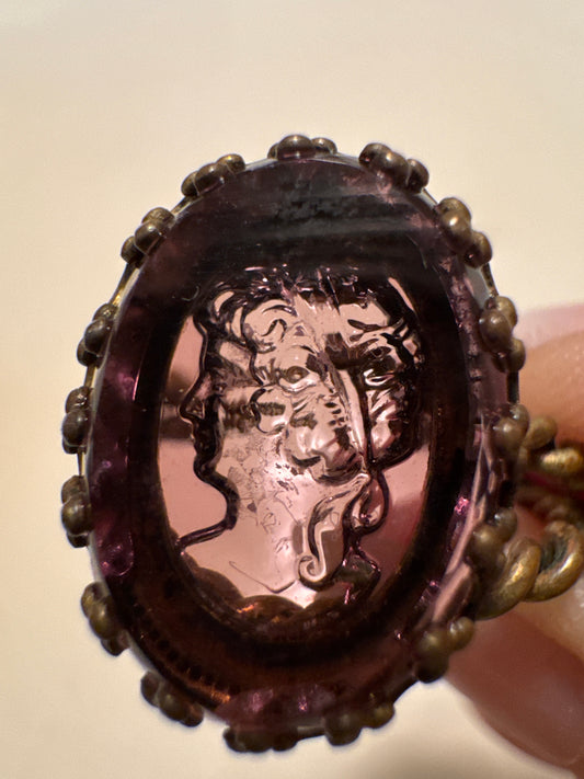 Beautiful amethyst colored glass cameo ring in brass. Summer