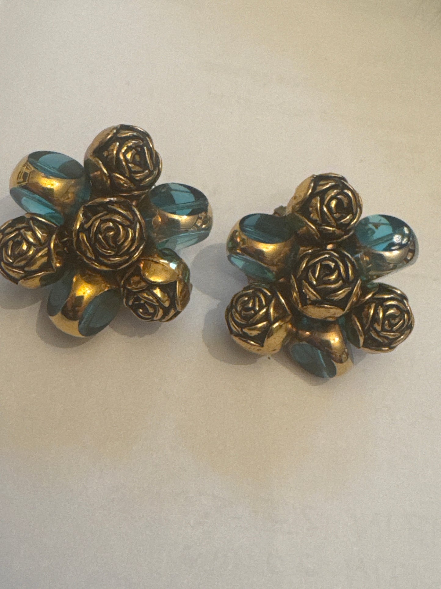 Beautiful gold tone and turquoise stone flower earrings. They actually match the necklace I showed from the live at the Louvre! Sourced in Paris