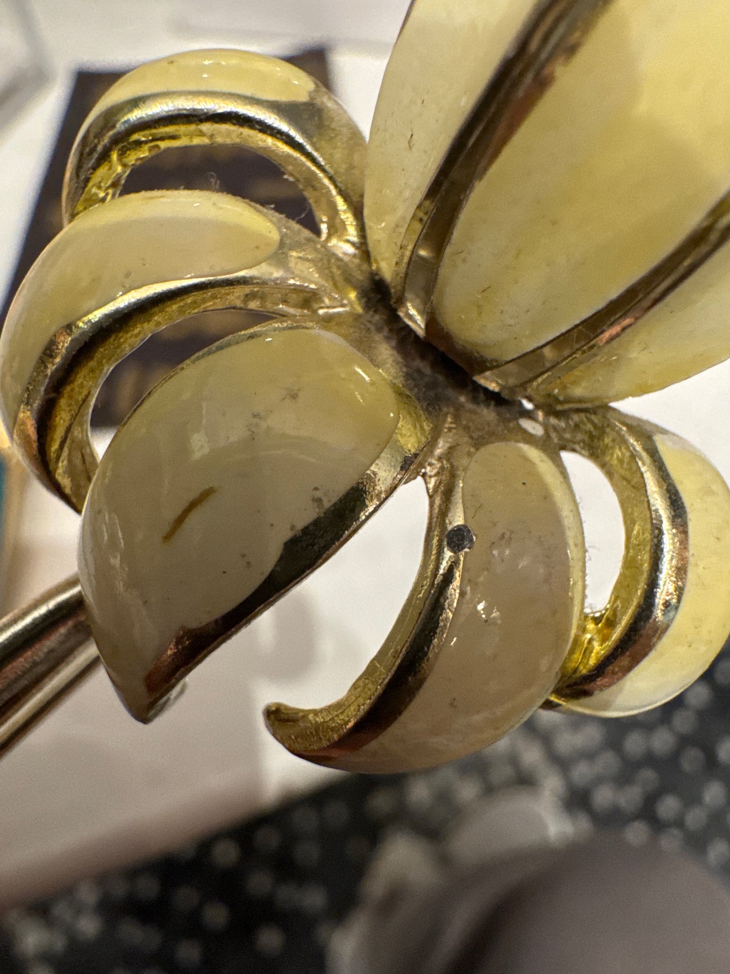 signed CORO flower brooch with pearl inside the petal. see photos for age related wear.