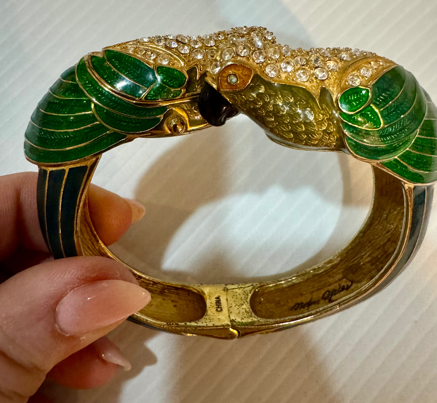 Amazing rare vintage signed Nolan Miller, enamel and rhinestone parrot, clock clamper bracelet