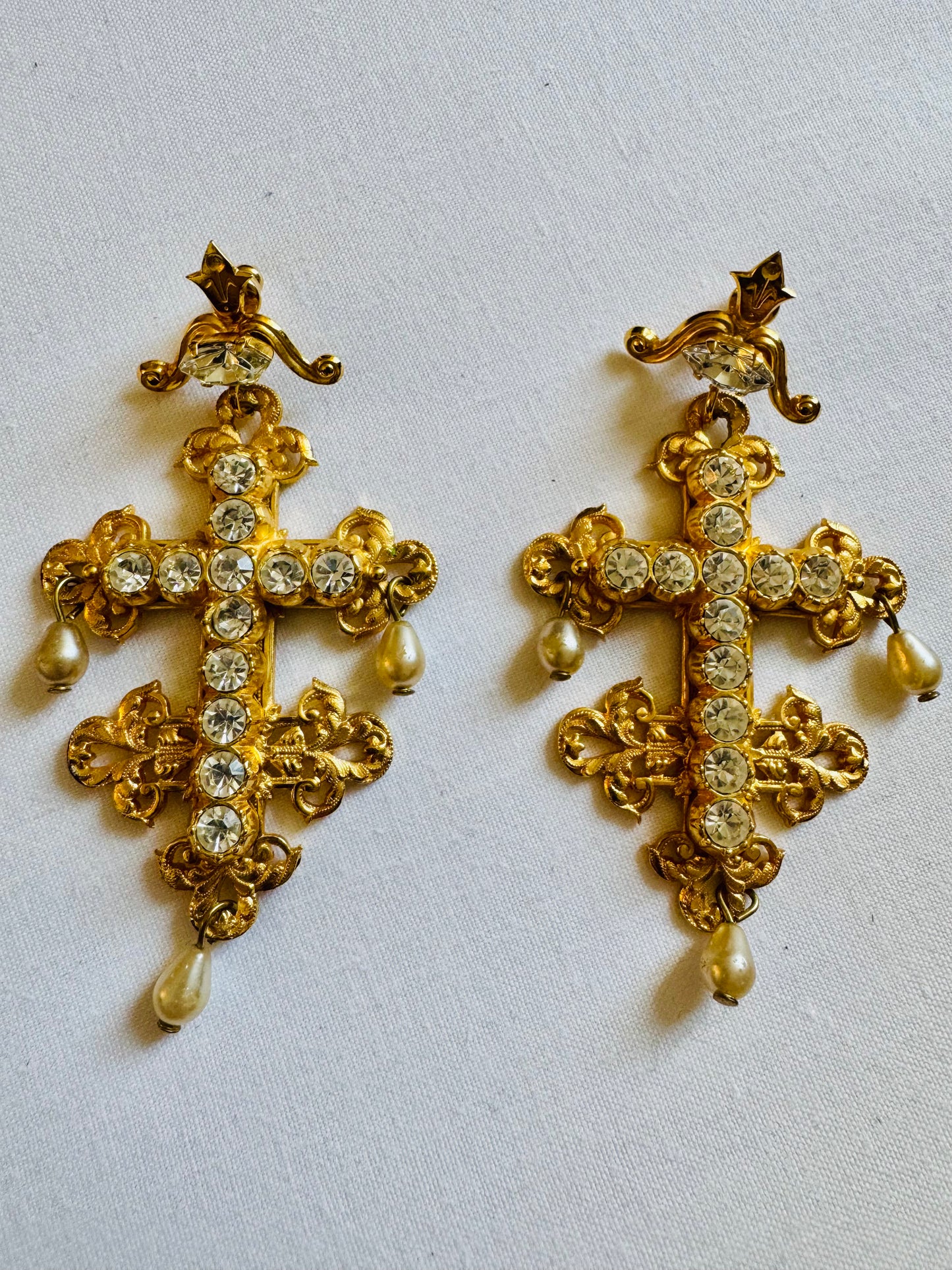 Zoe Coste gold tone, pearl and rhinestone dangle cross pierced earrings. Sourced in Paris.