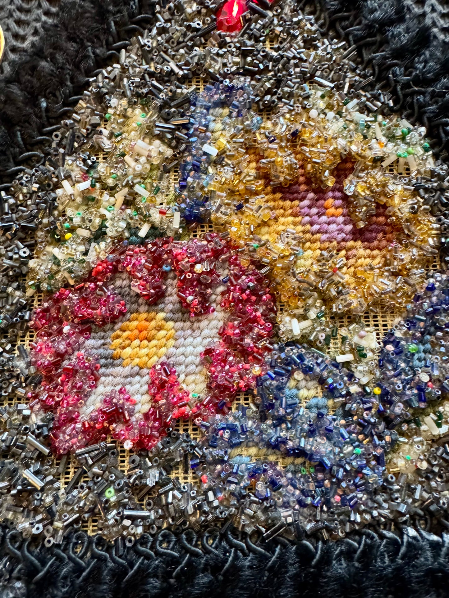 1970s knit handmade handbag with needlepoint beads and gold coins. Original label inside