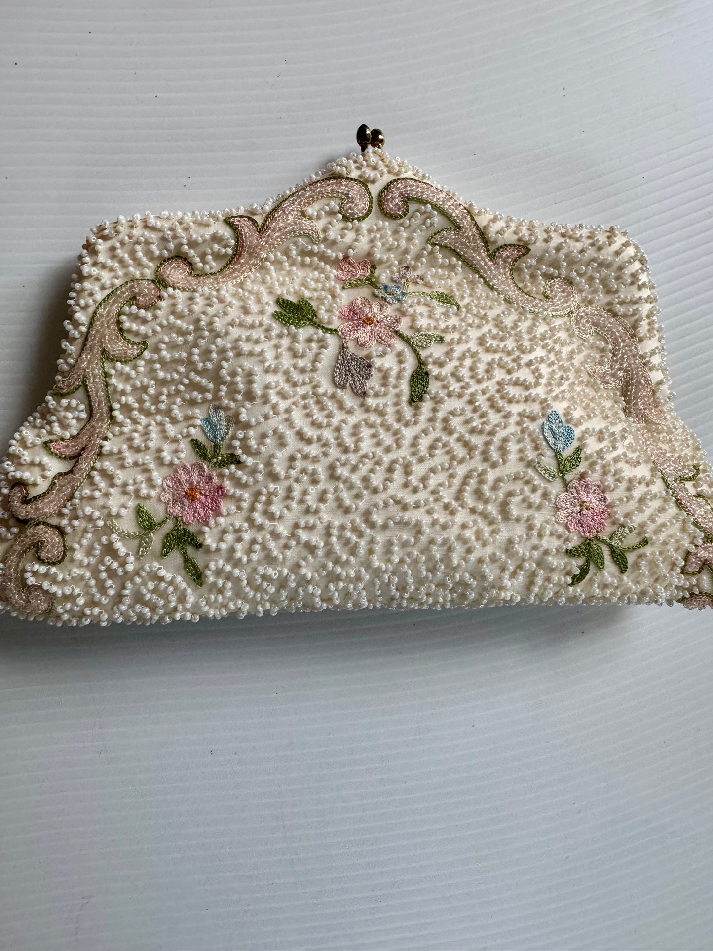 Stunning 1940s ivory beaded bag with small flowers. Sourced in Paris.