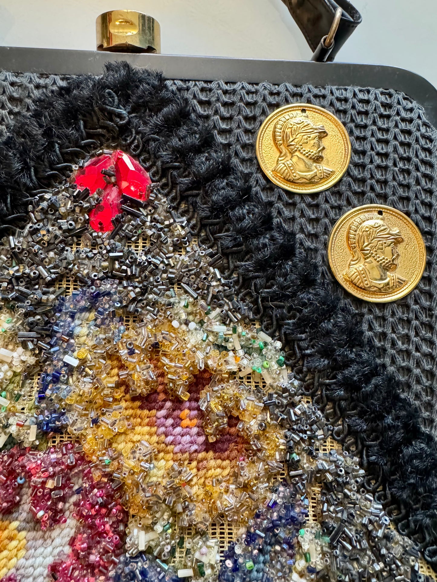 1970s knit handmade handbag with needlepoint beads and gold coins. Original label inside