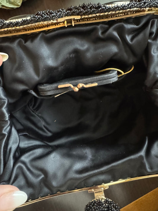 Beautiful 1930s satin black opera bag, with delicate chain and beautiful black beading and flower cameo detail at closure