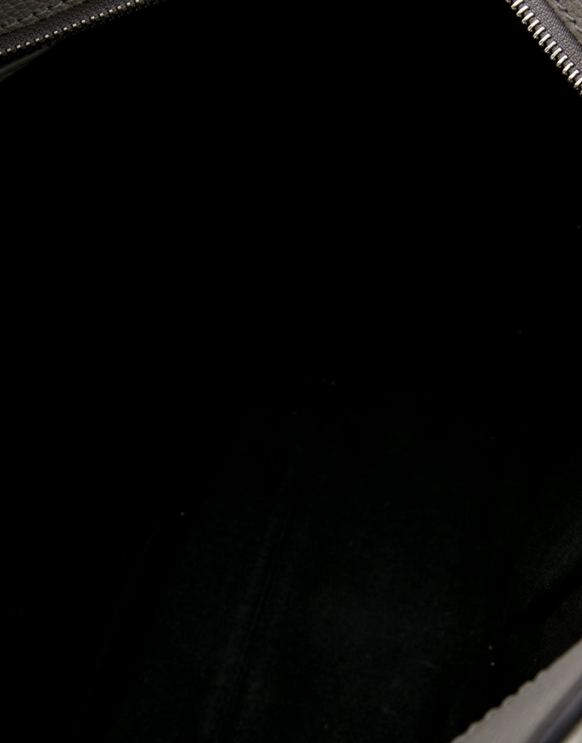 Vintage Alexander McQueen grey leather top-handle handbag with signature silver tone skull charm.