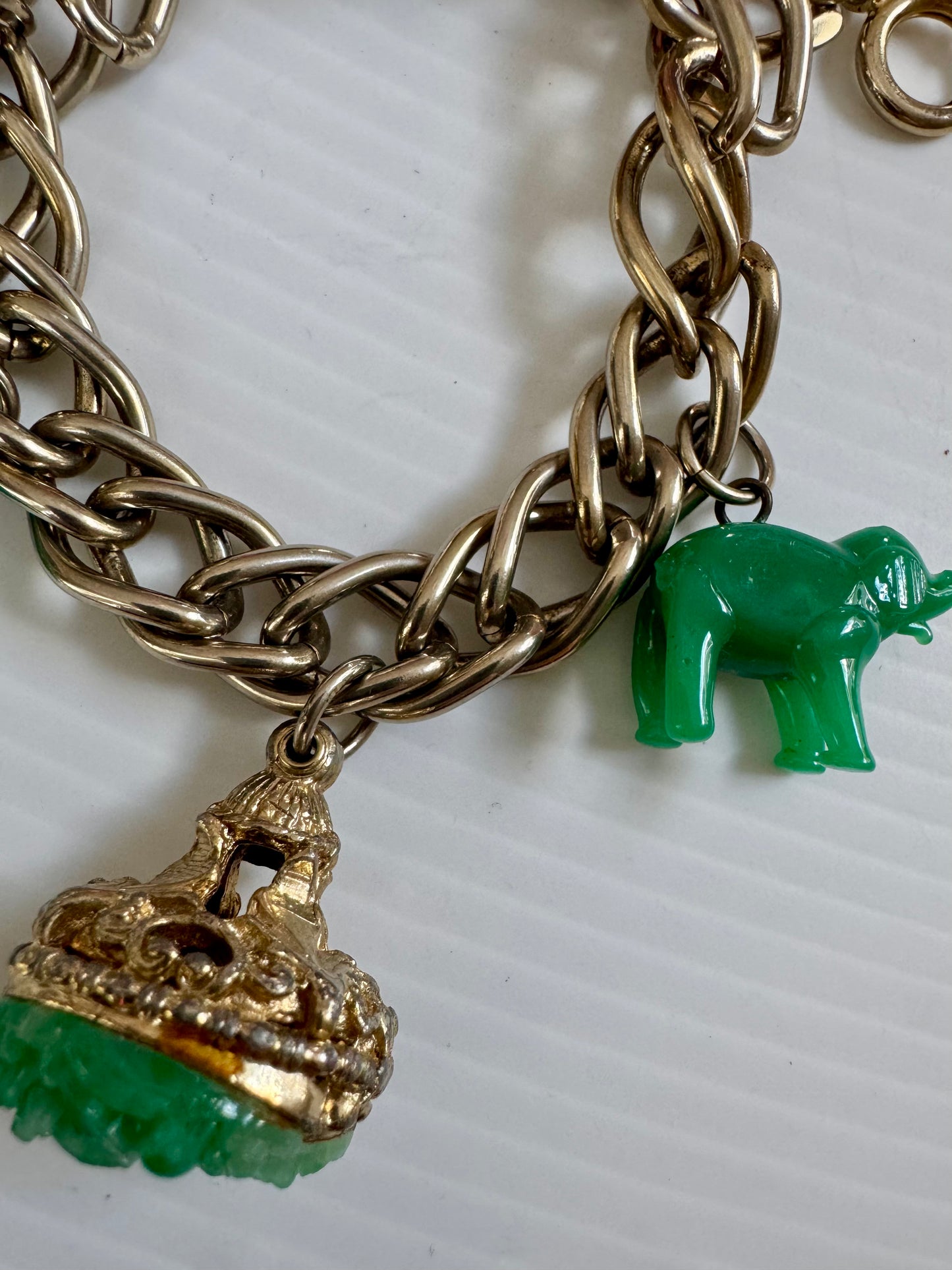 RARE 1960s gold tone chunky charm bracelet with jumbo jade charms and 2 adorable elephants (one missing a leg - see photo)