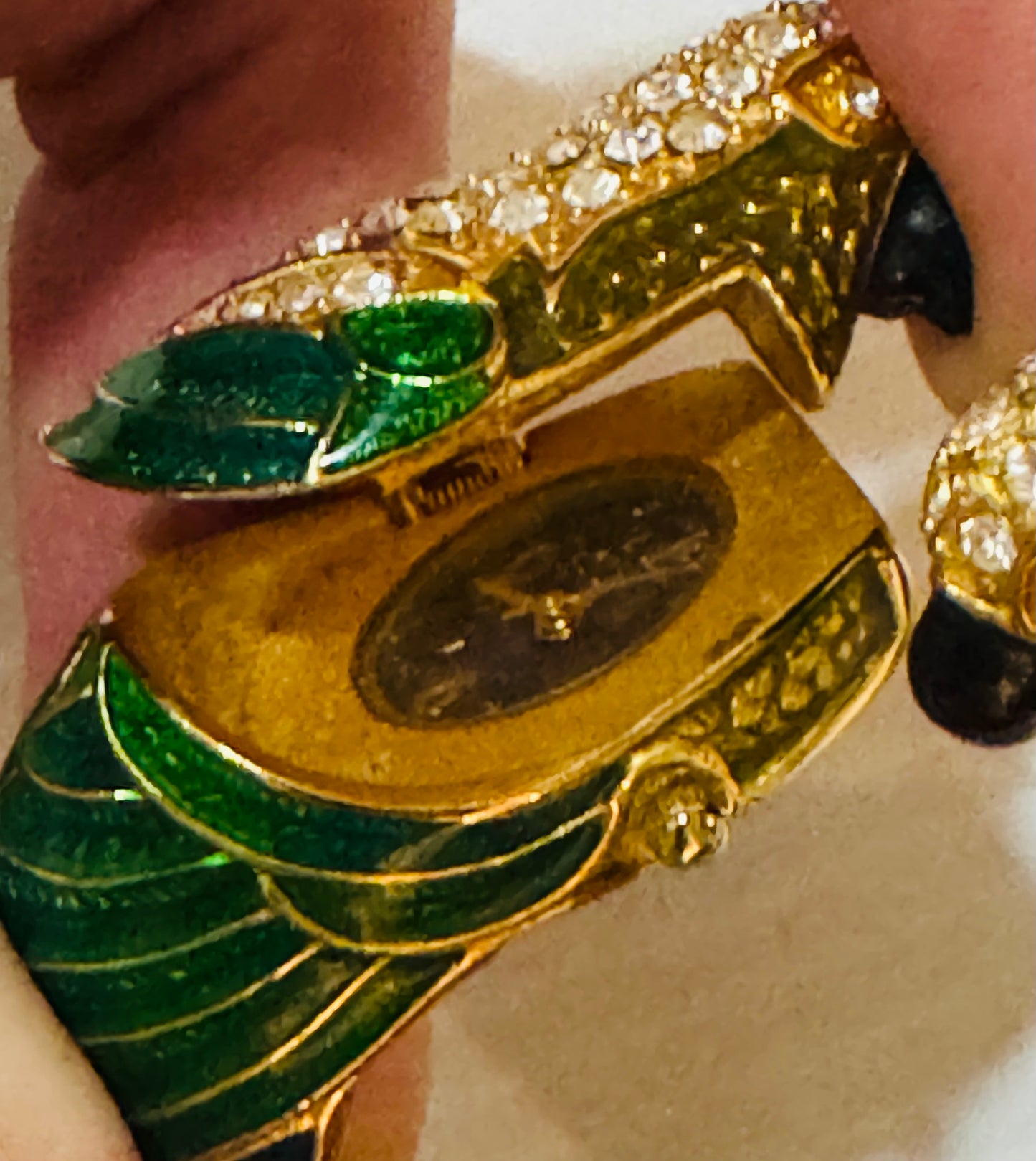 Amazing rare vintage signed Nolan Miller, enamel and rhinestone parrot, clock clamper bracelet