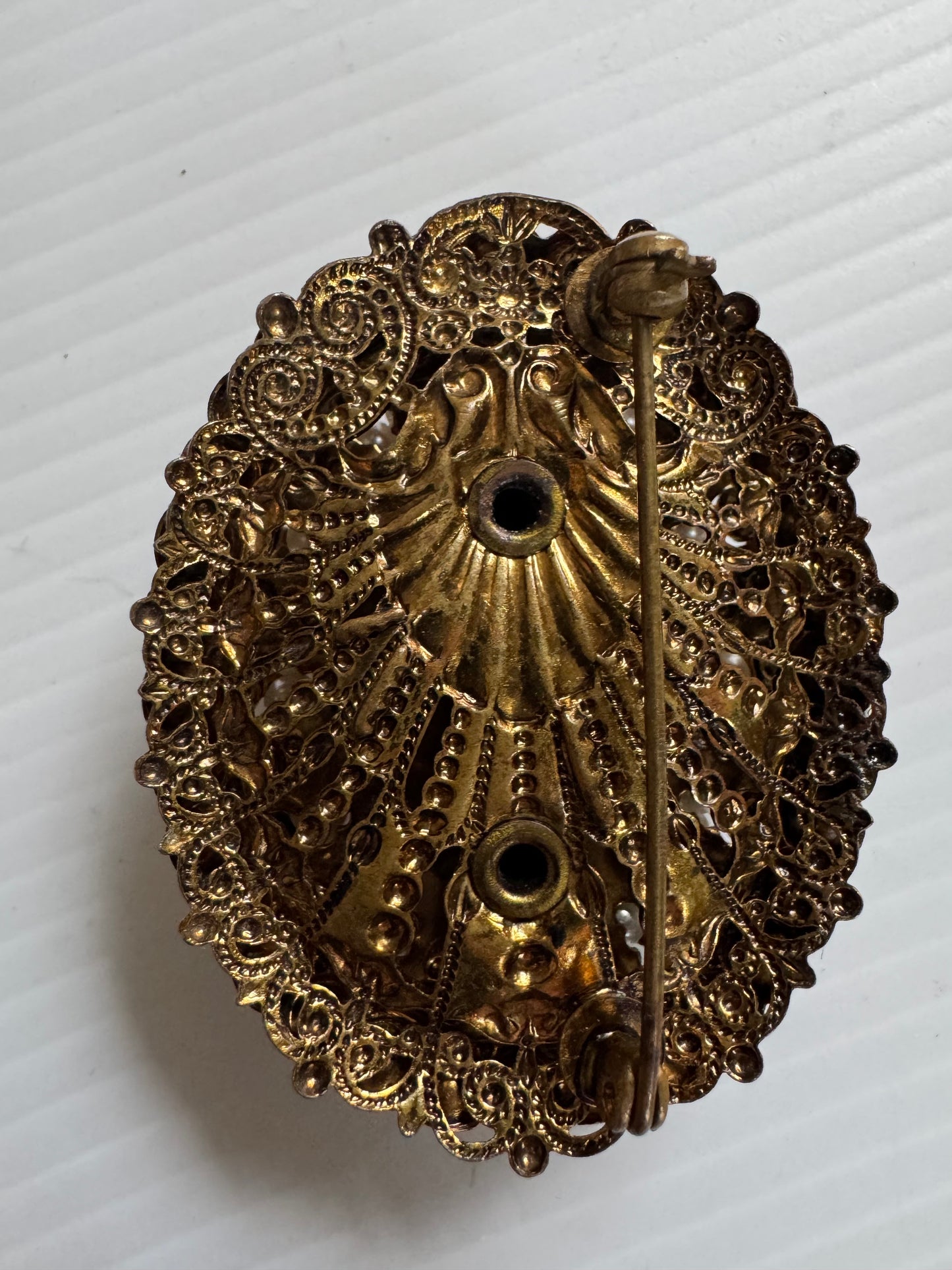 Beautiful 1950s black cameo with pearls. Sourced in Paris.