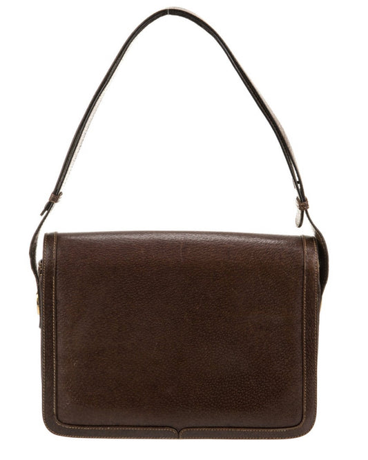 Beautiful 1970s vintage brown Gucci leather handbag. Top handle can adjust to longer or shorter shoulder strap. three interior pocket sections.