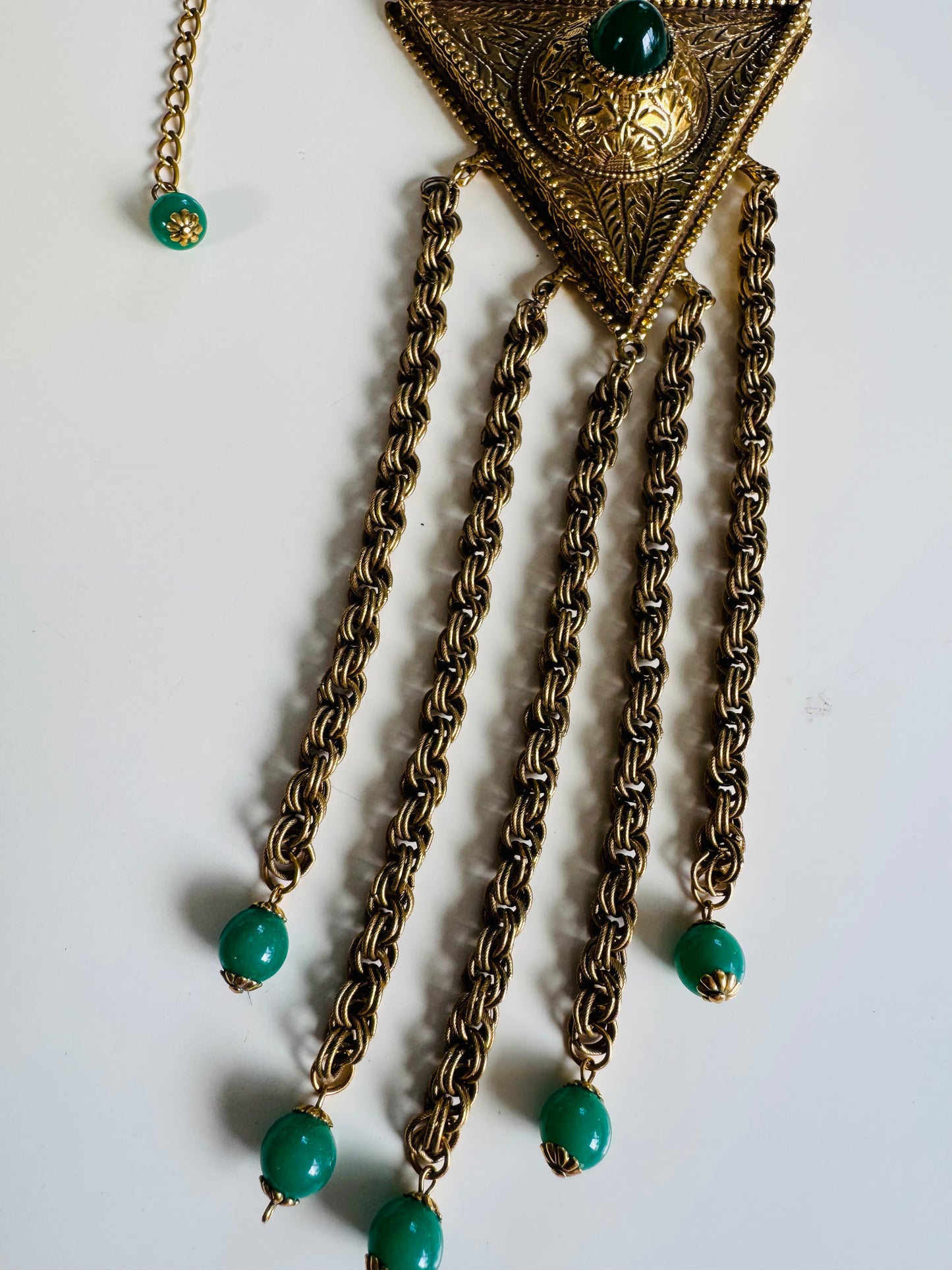 over the top jumbo 1960s gold tone necklace with giant triangular dangle pendant with green cabachon stones