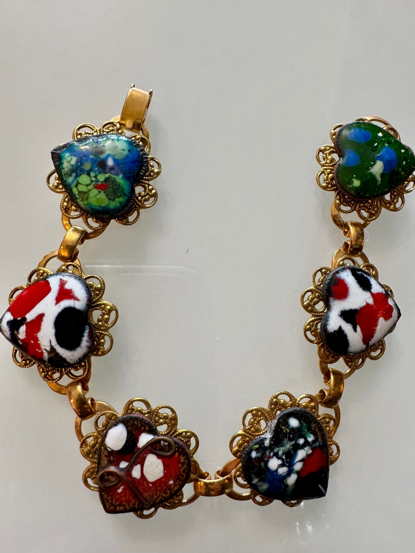 Vintage colorful heart bracelet with gold tone filagree