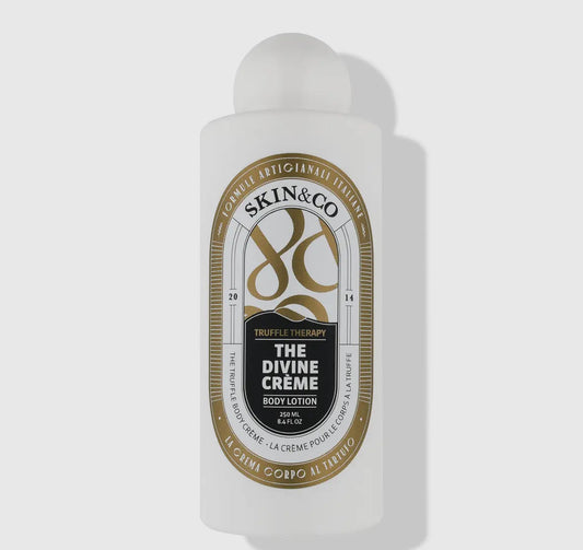 Indulge in the opulence of The Divine Crème, a luxurious body potion infused with Black Umbrian Truffle, hydrating Hyaluronic Acid, and plentiful antioxidant-rich properties derived from over 15, carefully selected native botanicals. This deeply nourishin