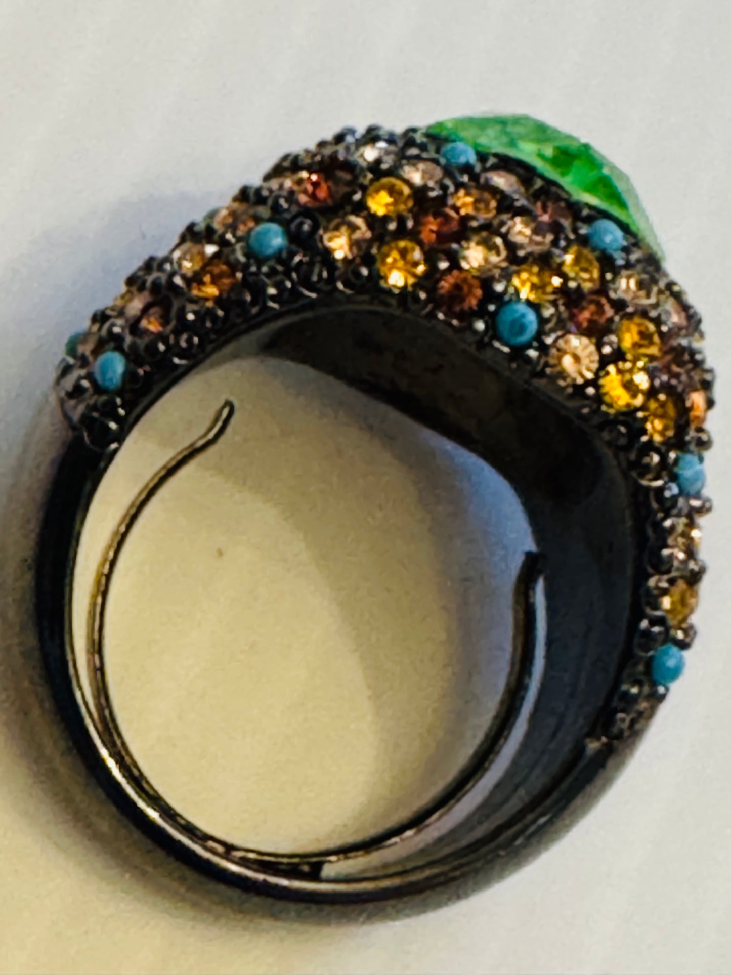 Beautiful vintage KJL Kenneth Jay Lane gunmetal ring with Amber rhinestones, turquoise stones and a jumbo green center stone
