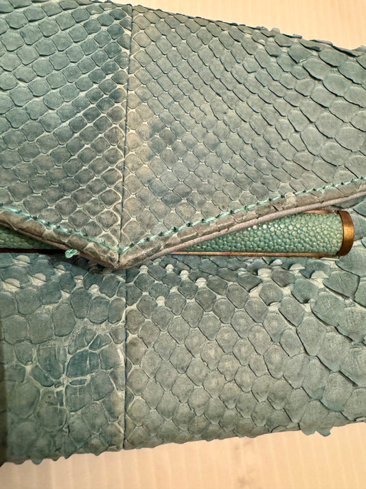 Beautiful light blue vintage, Ray Augusti snakeskin clutch bag with original Henri Bendel $495 price tag attached