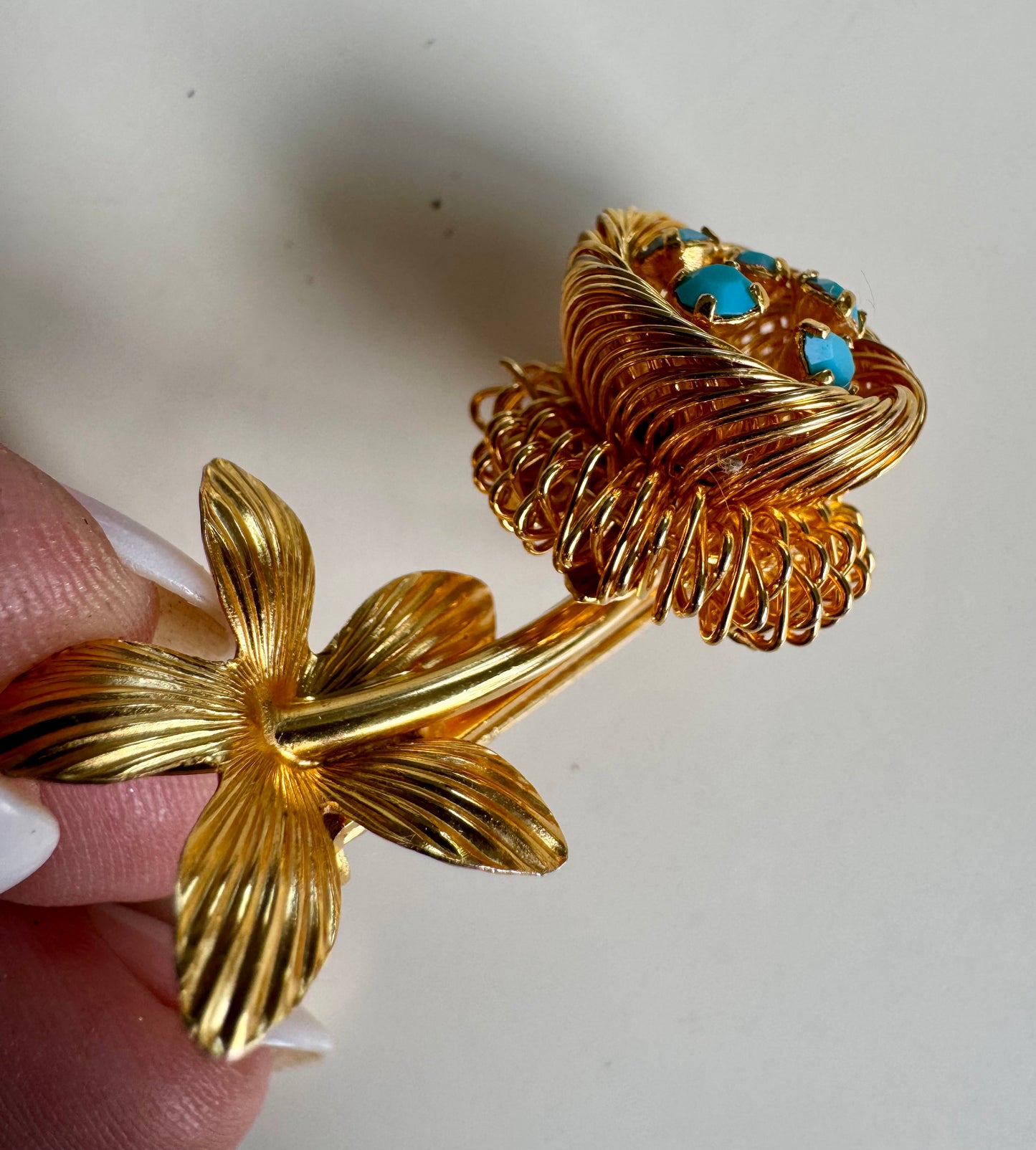 1950s adorable, mini gold tone, flower brooch with nest containing turquoise robins eggs