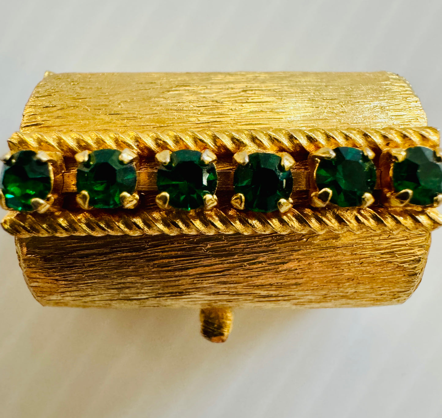Stunning gold tone, mini trinket box with green rhinestones. sourced in Paris.
