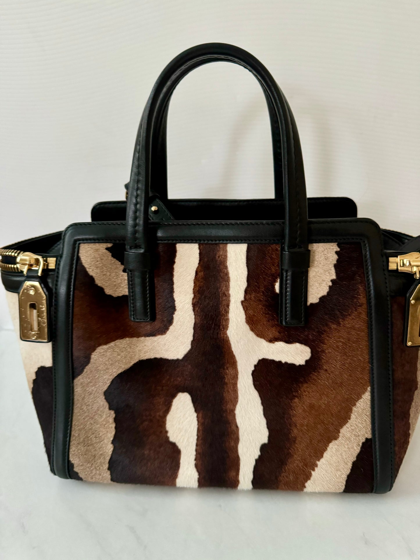 Pony hair and leather brown tone Ferragamo handbag with detachable shoulder strap