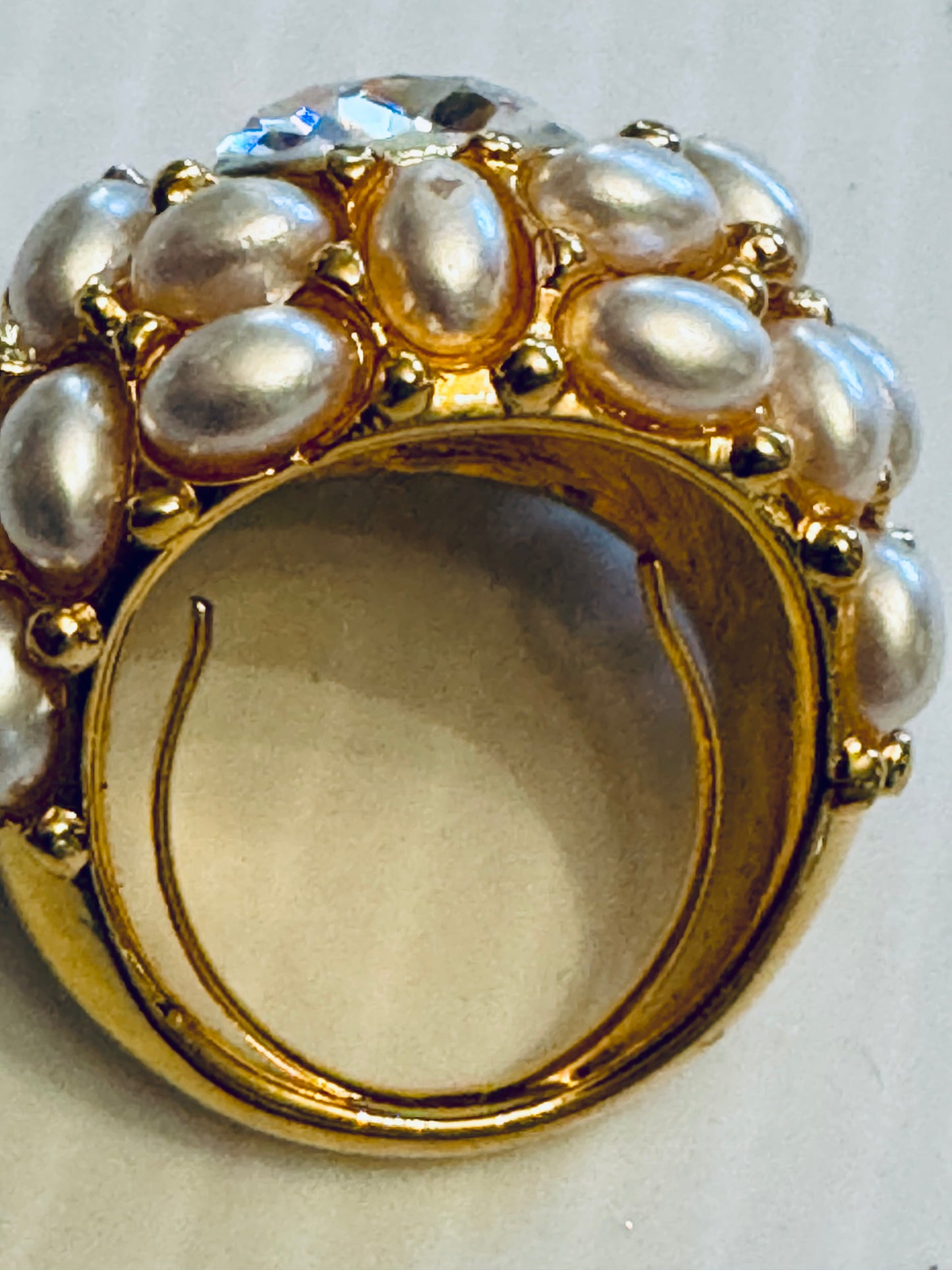Beautiful vintage KJL gold tone ring with pearls and jumbo clear rhinestone center stone