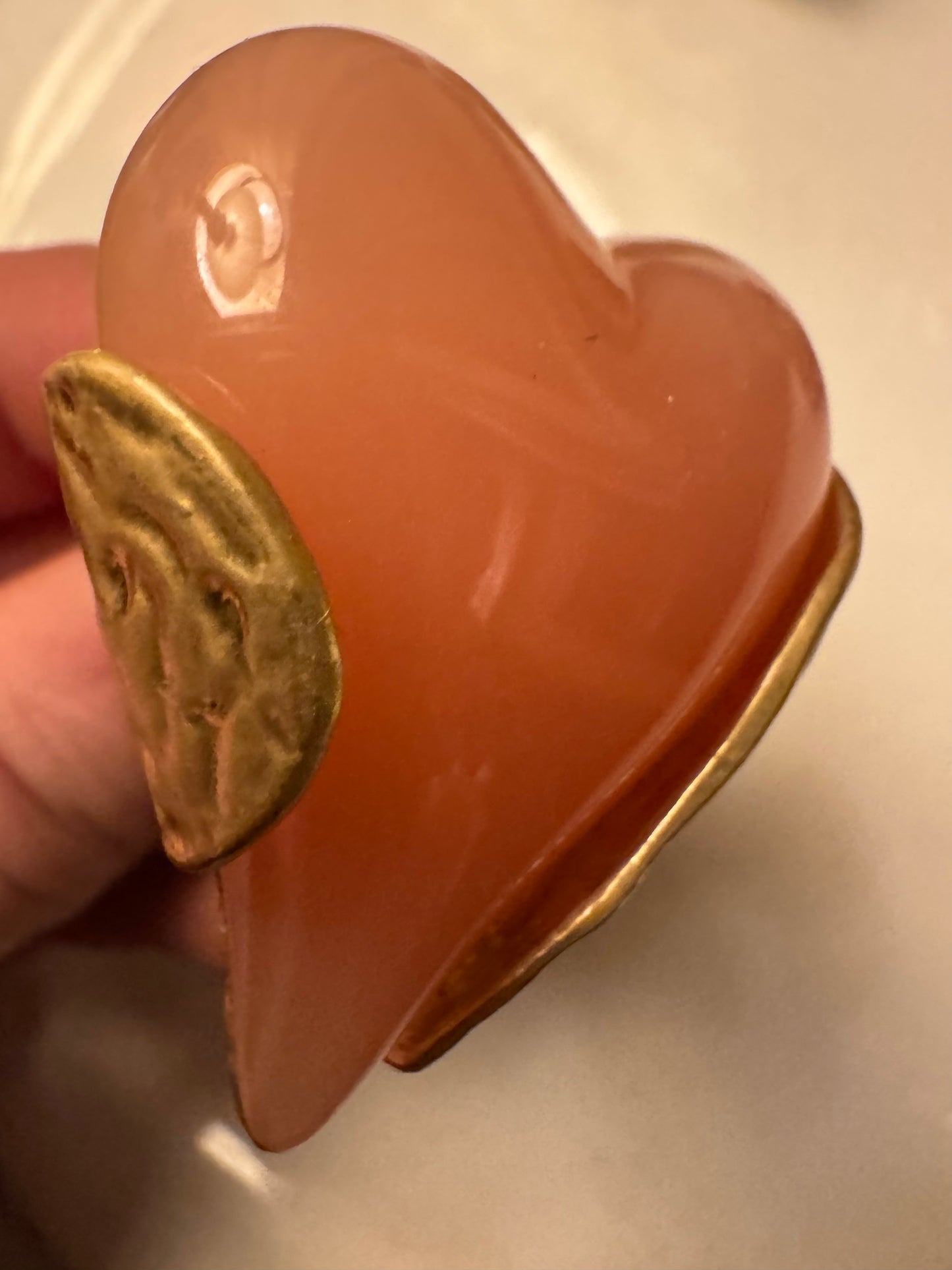 vintage 1980s heart lucite ring with gold tone. sourced in Paris.