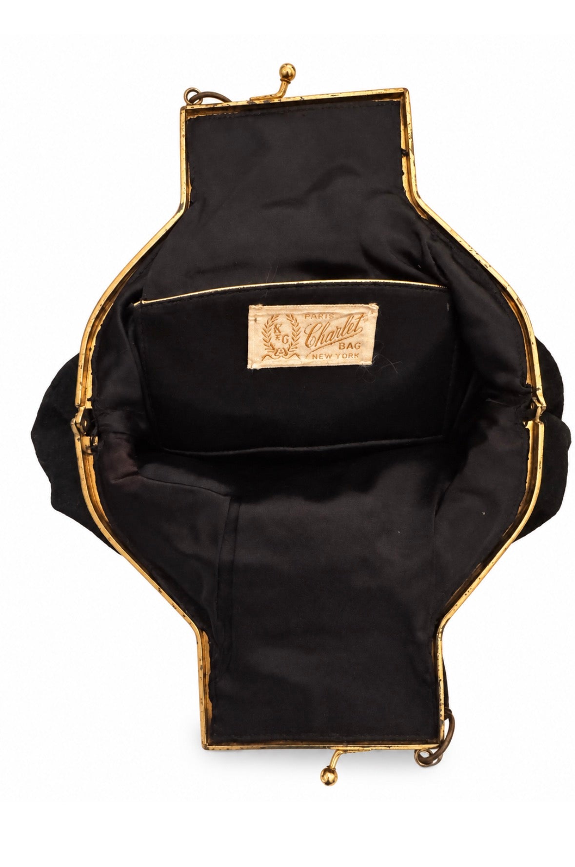 Beautiful 1930s/40s black wool clamshell opera bag with gold tone rosette metal frame