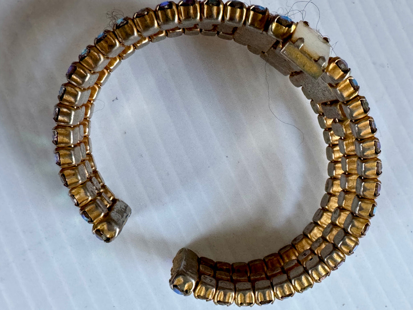 Stunning rhinestone bracelet with mother of pearl detail. Sourced in Paris.