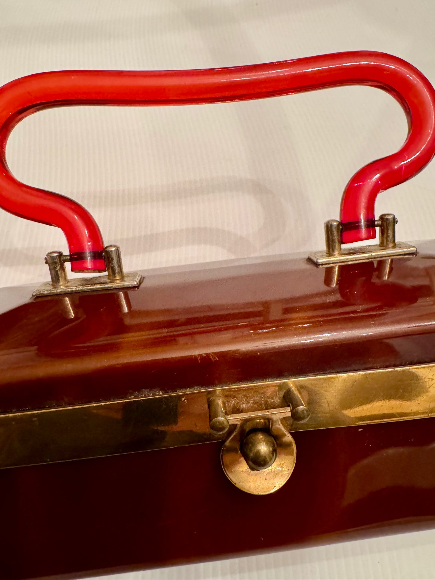 Stunning vintage 1940s lucite box bag in honey brown. Mirror has wear, otherwise perfect shape