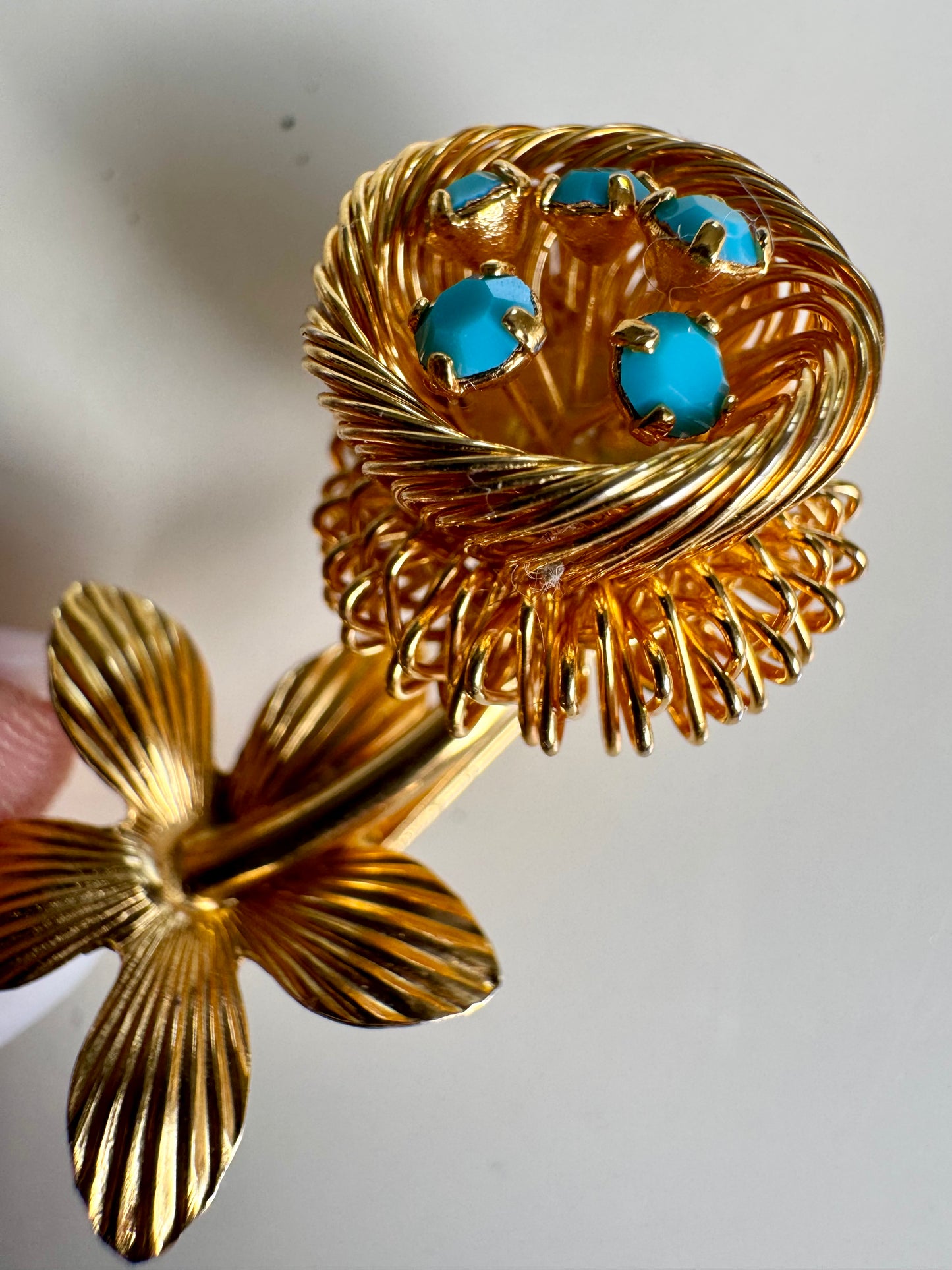 1950s adorable, mini gold tone, flower brooch with nest containing turquoise robins eggs