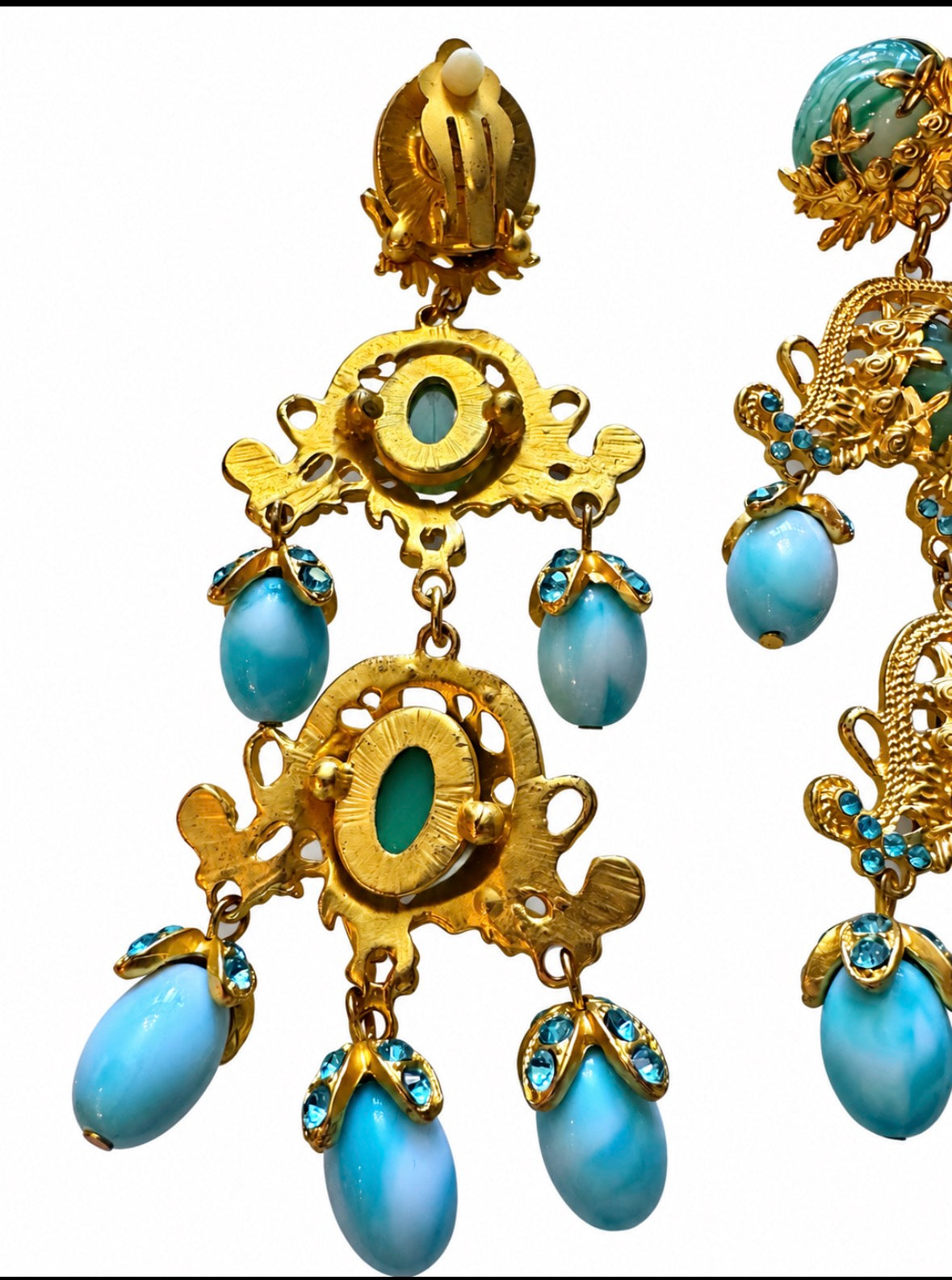 1980s gorgeous dangle clip on earrings with light turquoise colored stones on a gold tone filigree