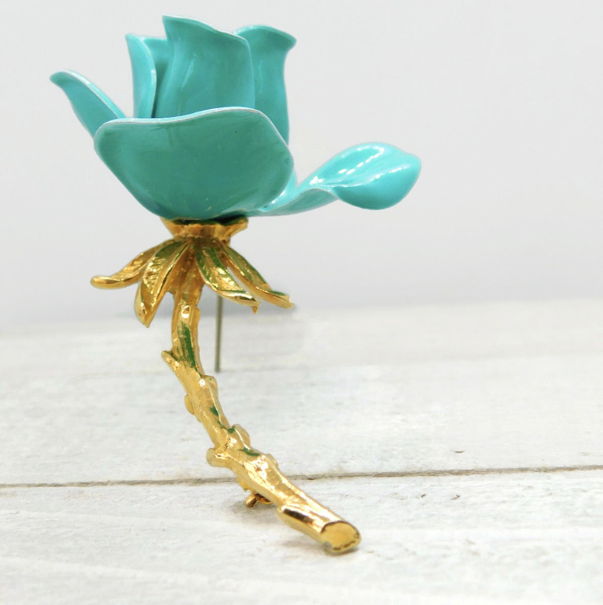 1970s turquoise, blue flower enamel brooch with gold tone, stem