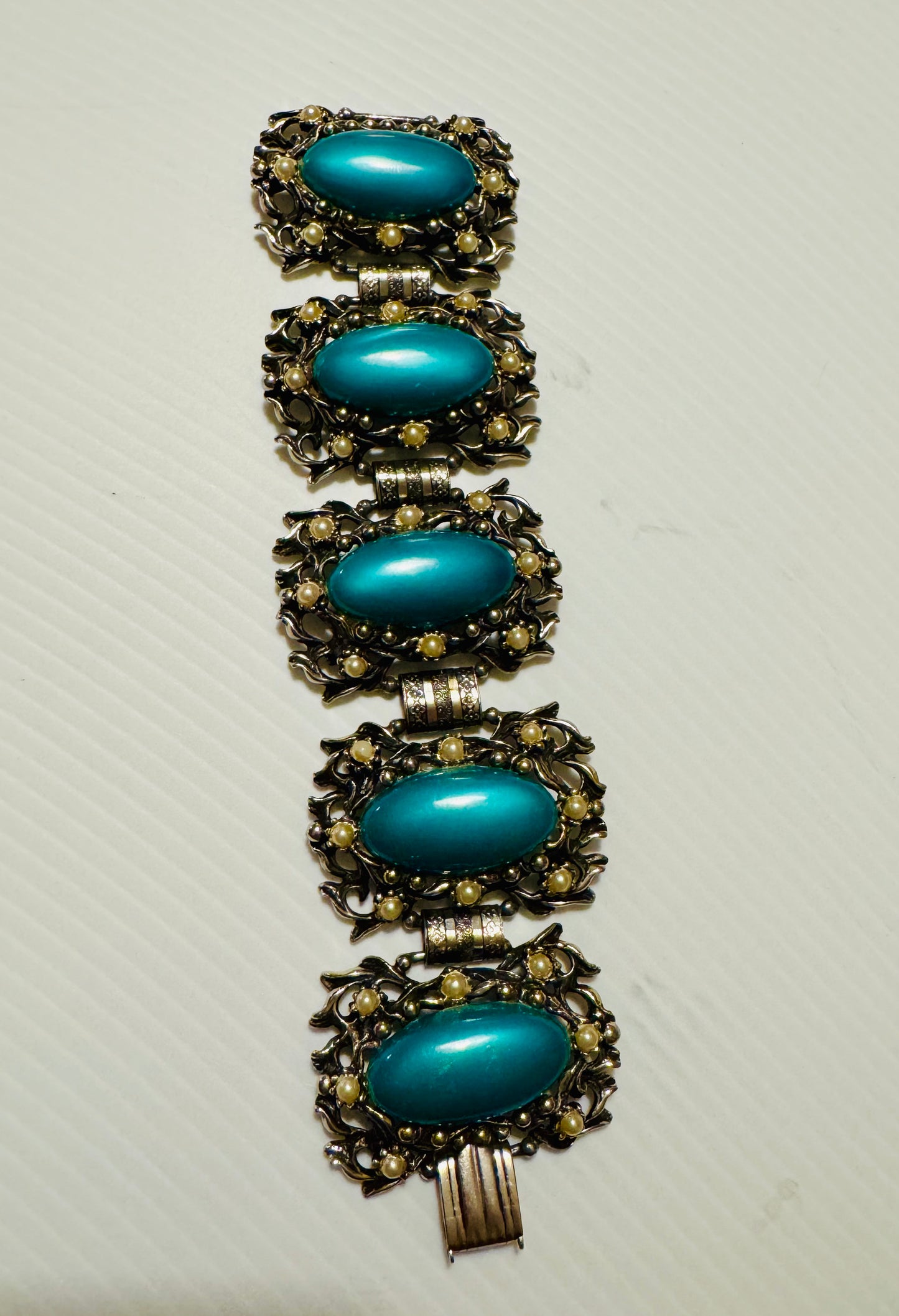 Jumbo 1950s bracelet with greenish/blue large stones surrounded by small pearls