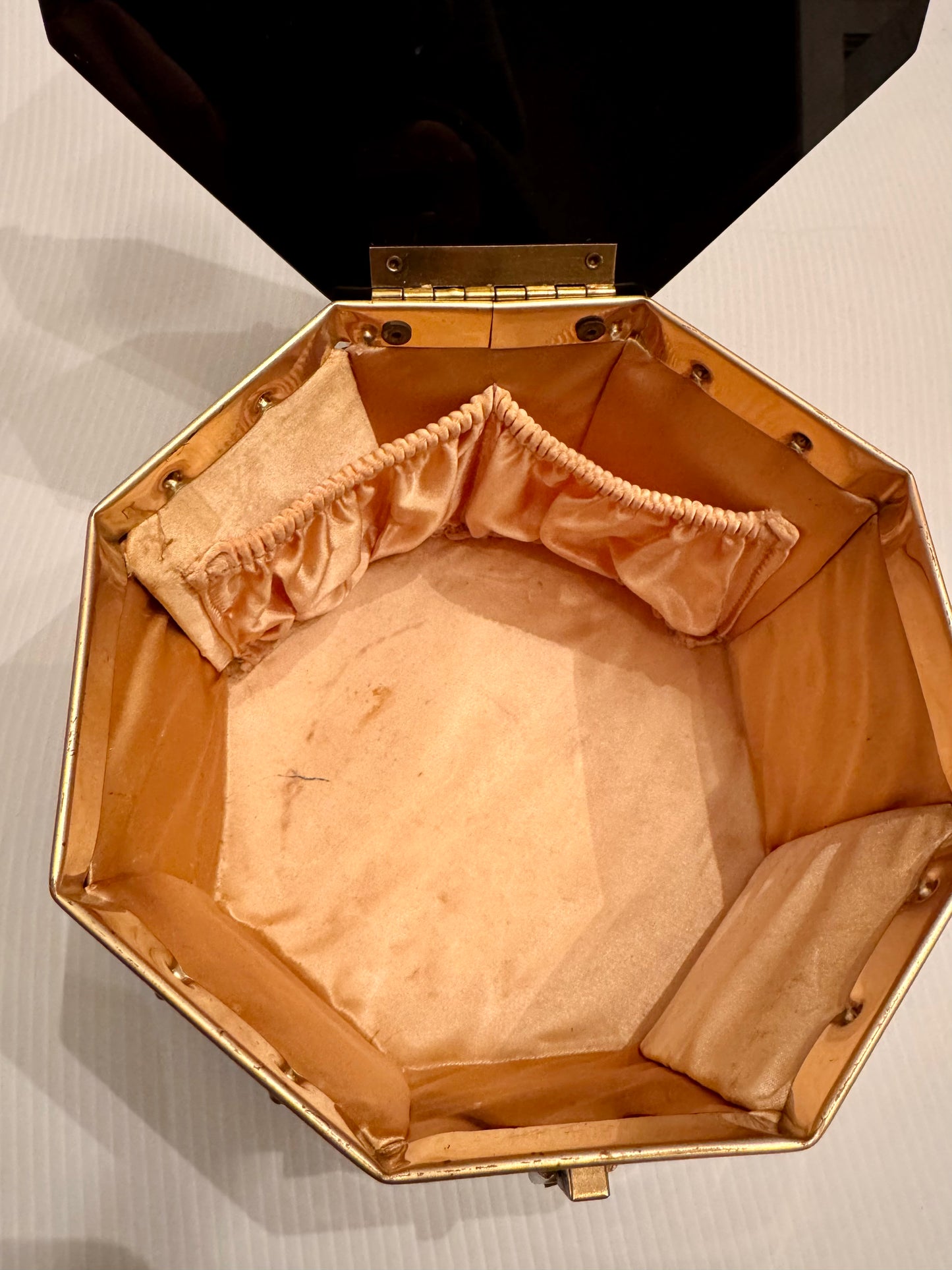 1950s Dorset Rex Octagonal woven brass metal box bag with black lucite top and peach satin lining