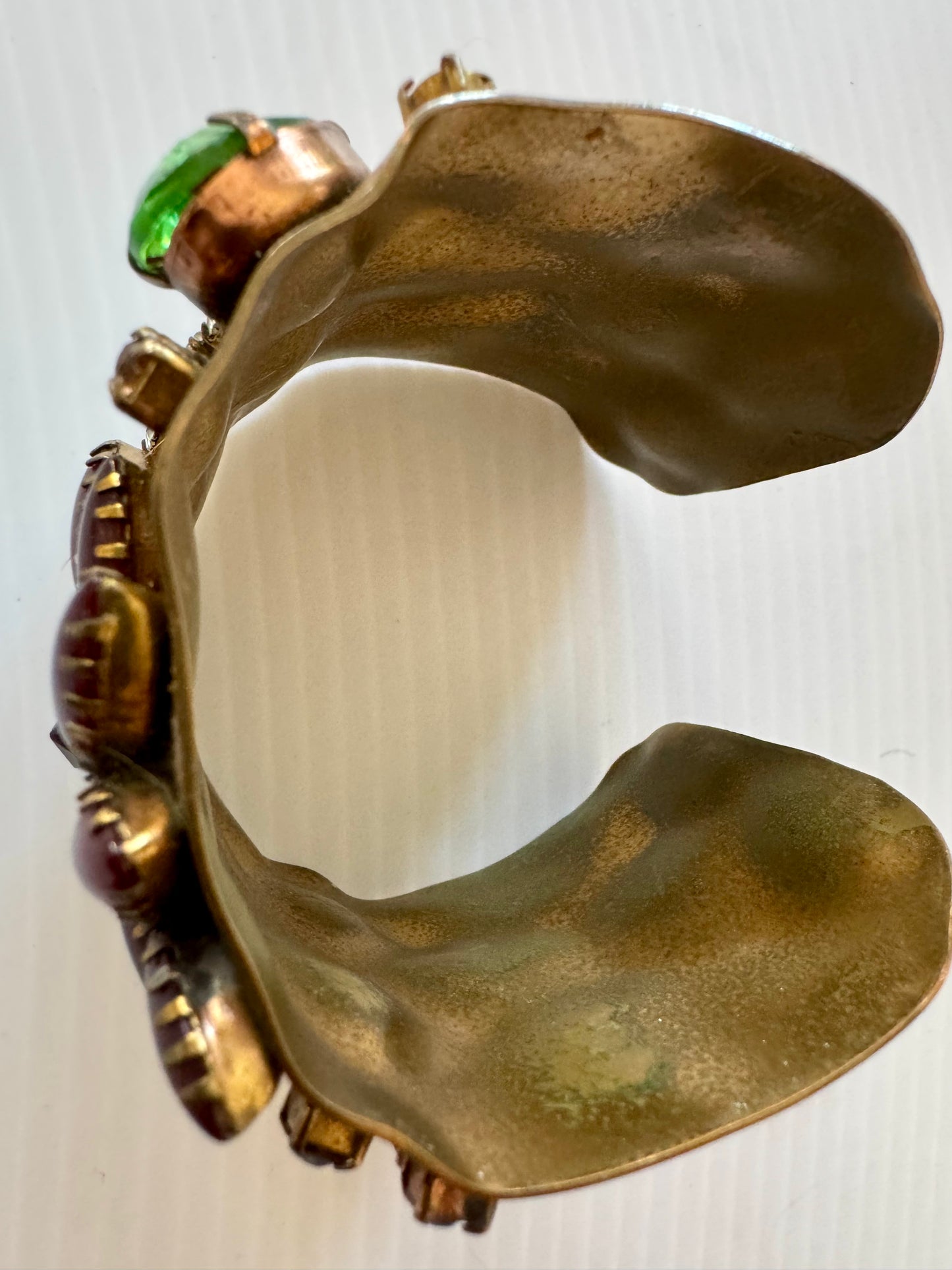 gorgeous vintage hammered cuff bracelet with multicolor rhinestones. Sourced in Paris.